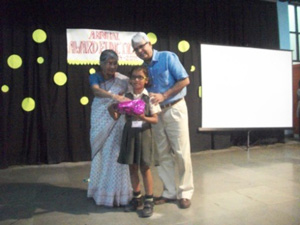 Mrs. Bhaskar Sen one of the donor of Deepalaya is giving an award to a girl